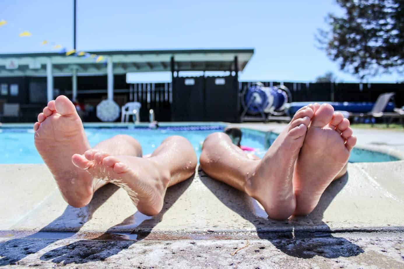 swimming feet side of pool.