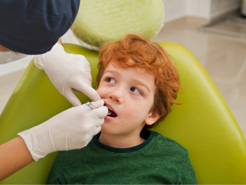 kid with fear of the dentist
