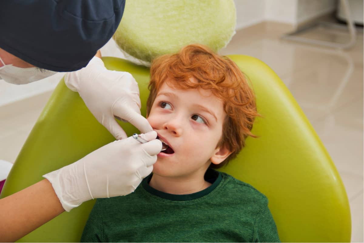 kid with fear of the dentist
