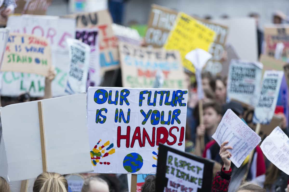 How do you talk to your kids about politics? activists and signs