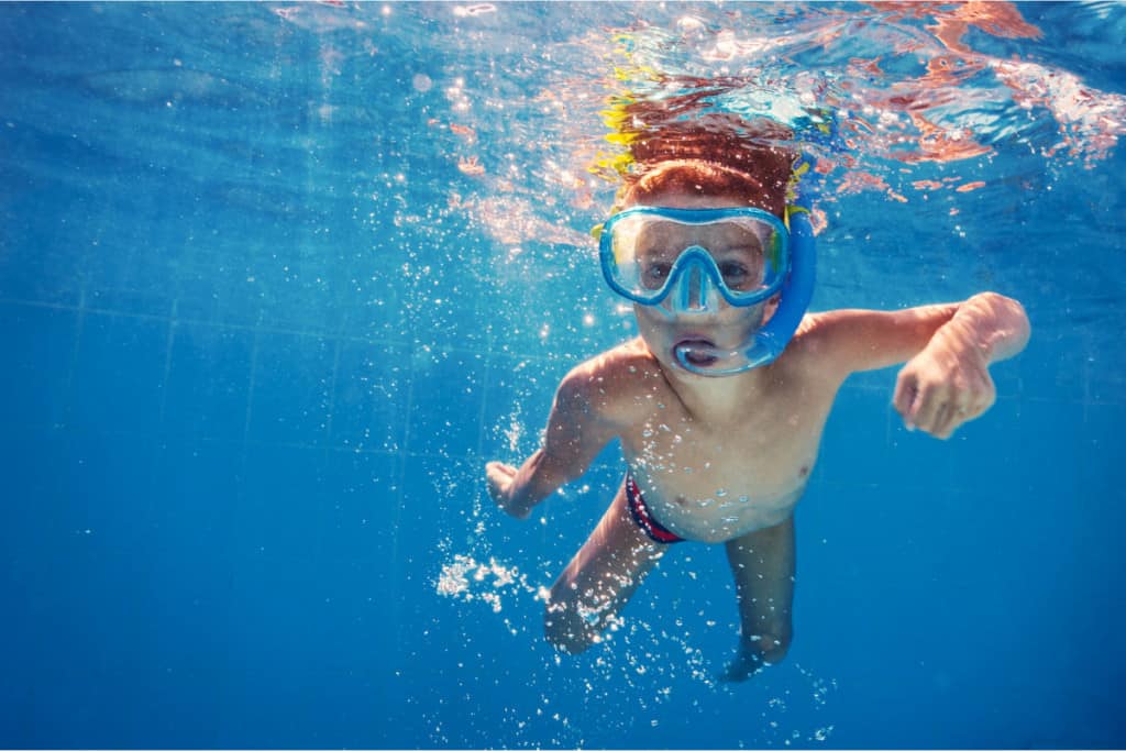 kids water safety in a pool snorkeling