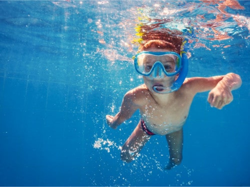 kids water safety in a pool snorkeling
