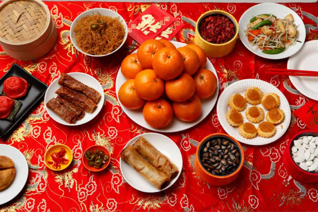 oranges, noodles, sweet rice cakes, Chinese new year food